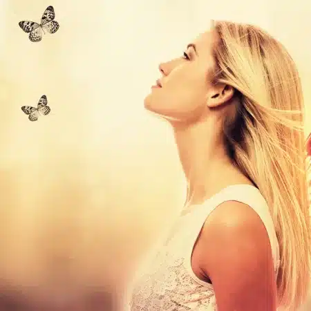 Beautiful young woman with butterfly wings